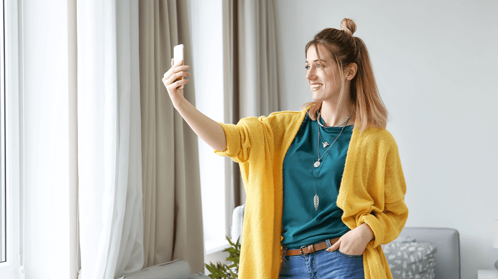 Eising Garden Centre woman wearing yellow cardigan and green shirt